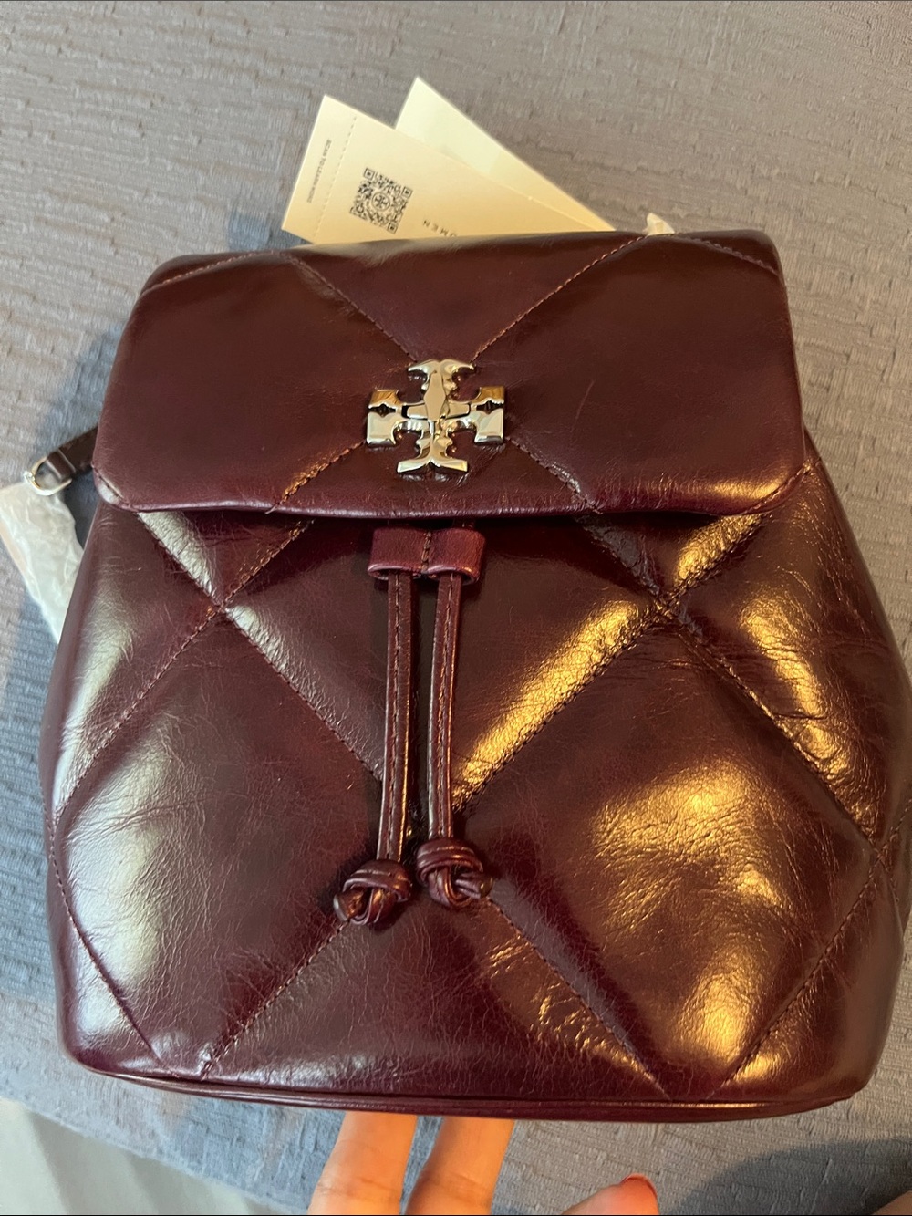 Tory Burch Kira Quilted Drawstring Backpack in Burgundy